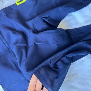 Fabletics motion leggings, blue with zippers size medium
